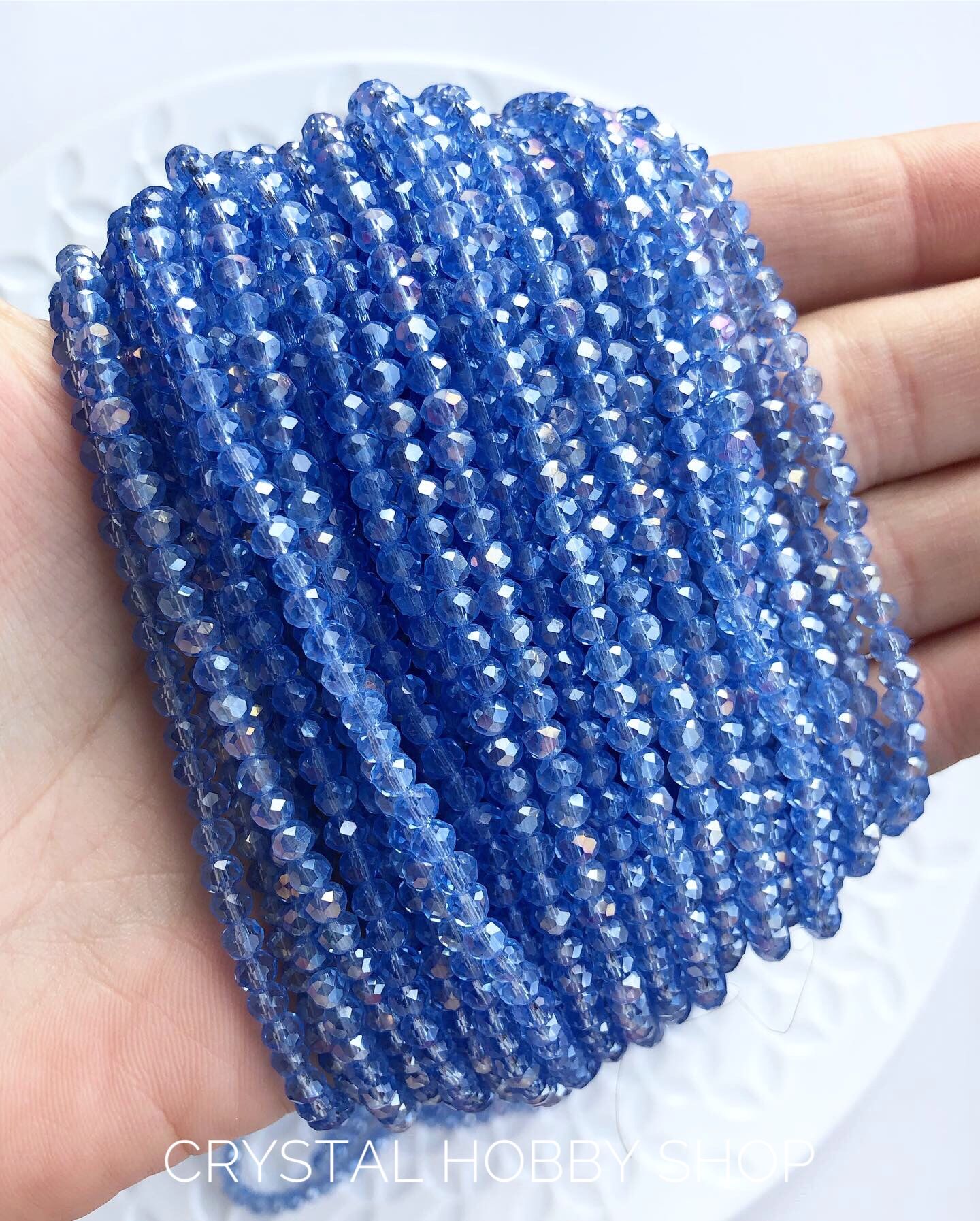 Стеклянные рондели 4 мм голубой с переливами Фото товара